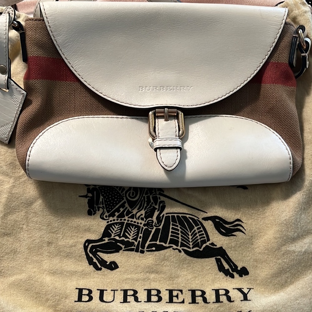 Burberry white leather adjustable strap.